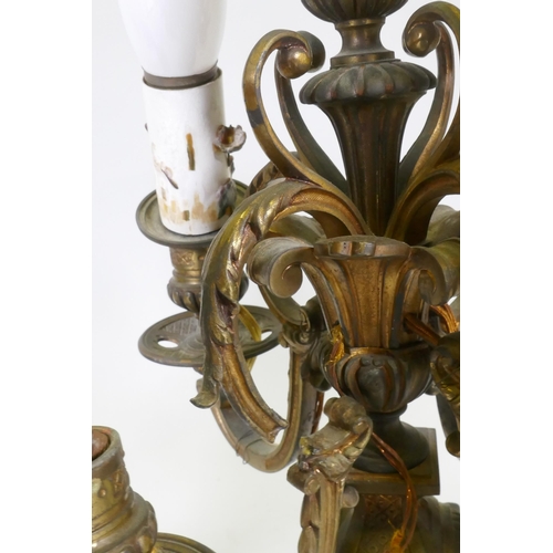 295 - A pair of ormolu and bronze four branch candelabra lamps, one arm AF, 58cm high