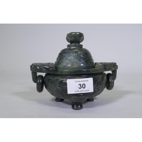 30 - Chinese jade koro and cover with carved decoration and ring handles, 13cm high