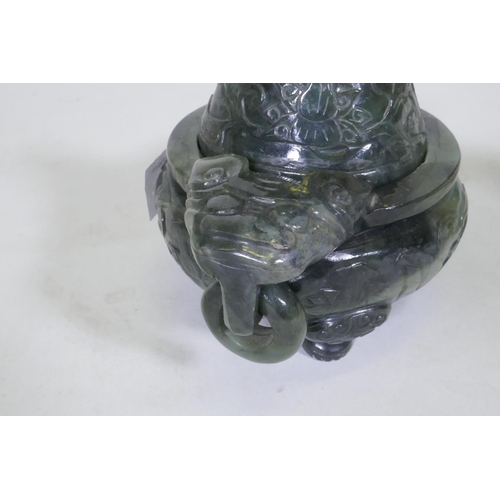 30 - Chinese jade koro and cover with carved decoration and ring handles, 13cm high