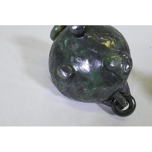 30 - Chinese jade koro and cover with carved decoration and ring handles, 13cm high