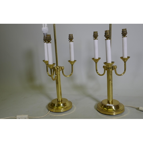 308 - A pair of three branch brass table lamps, 63cm high