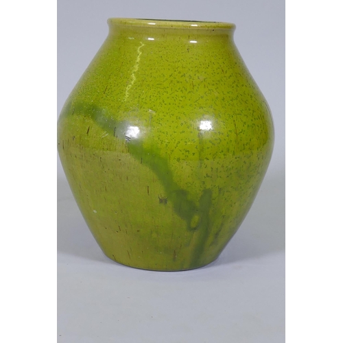 5 - Dora Lunn, a Ravenscourt pottery vase of baluster form with mottled drip green glaze, 28cm high