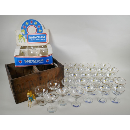 53 - A collection of 30 vintage Babycham glasses, including six in original display box, a plastic Babych... 