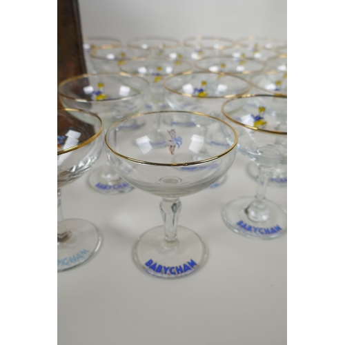 53 - A collection of 30 vintage Babycham glasses, including six in original display box, a plastic Babych... 