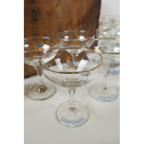 53 - A collection of 30 vintage Babycham glasses, including six in original display box, a plastic Babych... 