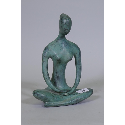 55 - A contemporary bronze figure of a seated nude, 27cm high, unsigned