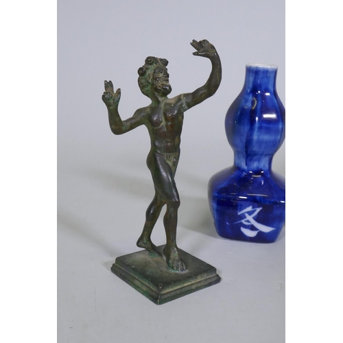 57 - A brass figure of a fawn after the antique, 15cm high, another of Shiva, a North African ceramic bud... 