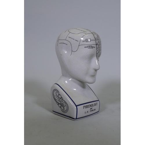 58 - A ceramic phrenology head, 24cm high