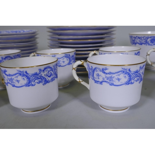 60 - A Royal Worcester twelve place porcelain tea set with blue transfer and gilt decoration, pattern no.... 