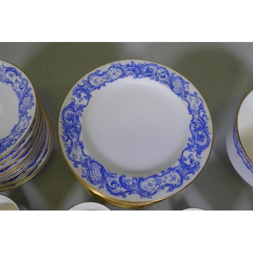 60 - A Royal Worcester twelve place porcelain tea set with blue transfer and gilt decoration, pattern no.... 