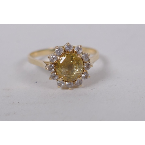 601 - 14ct gold ring set with central yellow sapphire surrounded by white sapphires, size N/O