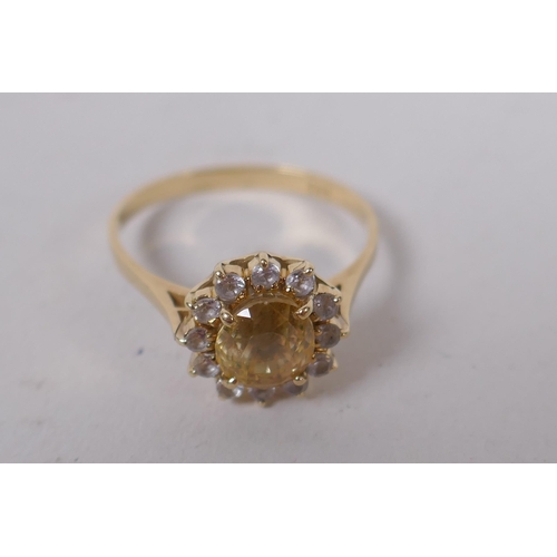 601 - 14ct gold ring set with central yellow sapphire surrounded by white sapphires, size N/O