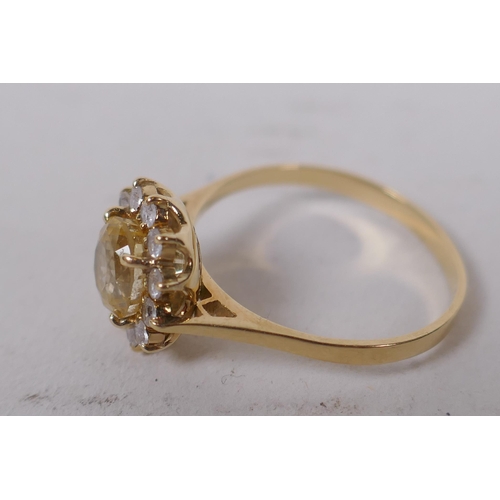 601 - 14ct gold ring set with central yellow sapphire surrounded by white sapphires, size N/O