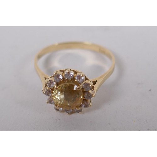 601 - 14ct gold ring set with central yellow sapphire surrounded by white sapphires, size N/O