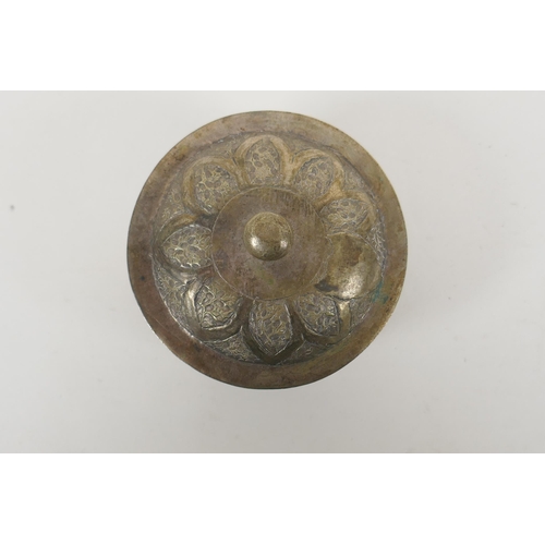 609 - An Islamic white metal bowl, with all over script decoration, 8cm diameter, 98g