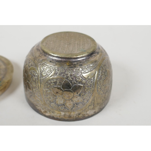 609 - An Islamic white metal bowl, with all over script decoration, 8cm diameter, 98g