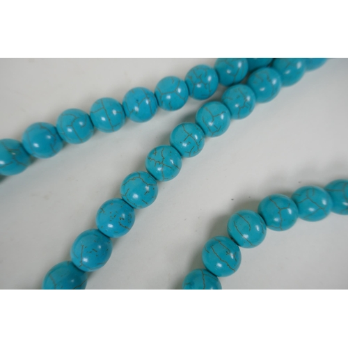 610 - Three strings of turquoise beads, 42cm long