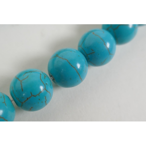 610 - Three strings of turquoise beads, 42cm long