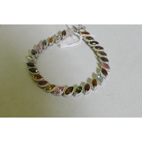 617 - Hallmarked silver bracelet set with coloured gemstones, 20cm long