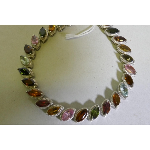 617 - Hallmarked silver bracelet set with coloured gemstones, 20cm long