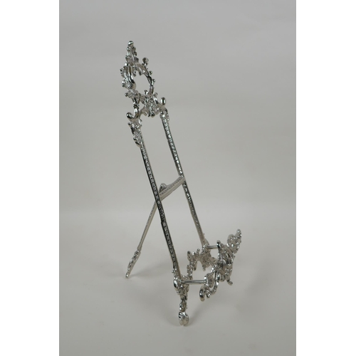 620 - A silvered metal decorative easel, 40cm high