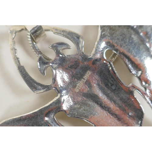 629 - A sterling silver pendant necklace in the form of a winged beetle, 9cm wide