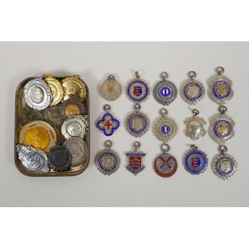 637 - A quantity of vintage sporting medals, mostly silver, 145g