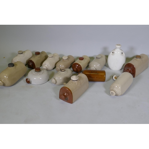 64 - A collection of C19th/C20th stoneware footwarmers and a hot water bottle by Royal Doulton, Langley, ... 