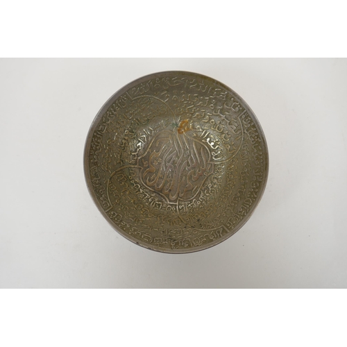 641 - An Islamic white metal bowl, with all over script decoration, 12cm diameter, 117g