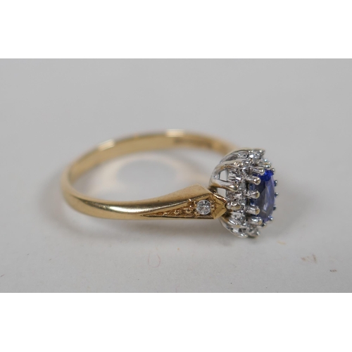 648 - A 9ct gold, sapphire and diamond cluster ring, approx 0.1ct, approx size K