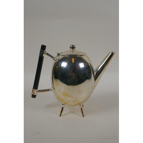 650 - A Christopher Dresser style silver plated teapot, 18cm high