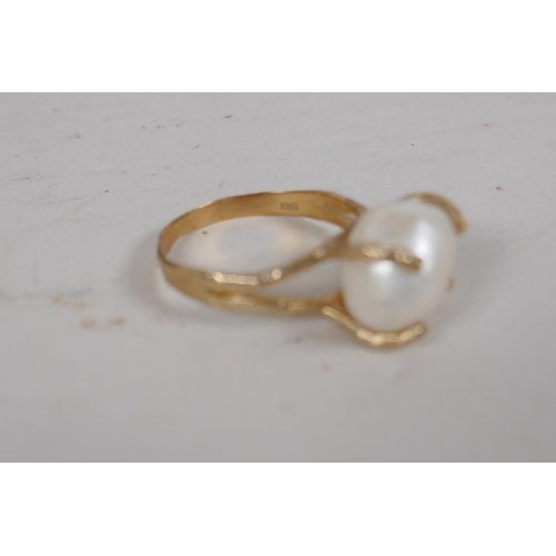 657 - A pair of faux pearl 'Jackie's' (Kennedy) replica earrings, and a 9ct gold ring set with a large pea... 