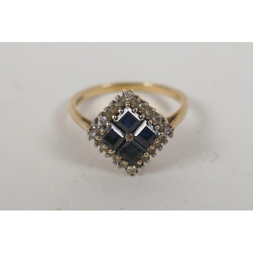 659 - An antique 9ct gold square headed dress ring set with white sapphires and tanzanite, size O