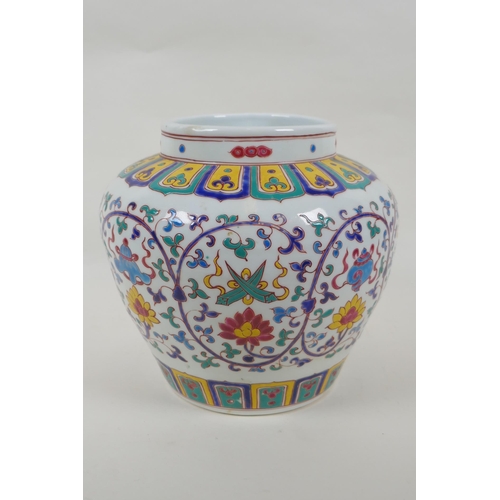 70 - A Chinese polychrome porcelain jar with enamel decoration of flowers and the eight Buddhist treasure... 