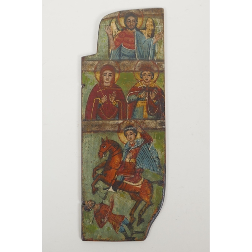 803 - An C18th Greek icon panel from a triptych depicting saints, oil on board, 10 x 29cm