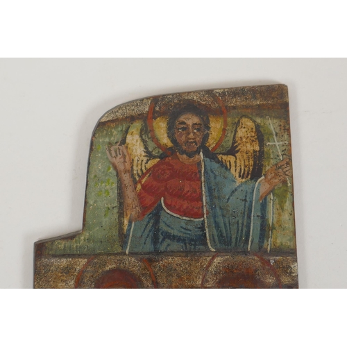 803 - An C18th Greek icon panel from a triptych depicting saints, oil on board, 10 x 29cm