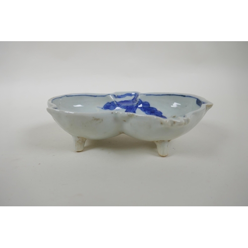 83 - A Japanese Meiji period blue and white porcelain sauce bowl in the form of peaches, and another in t... 