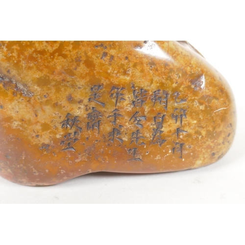 96 - A Chinese soapstone seal with carved Lohan decoration, 10 x 7cm