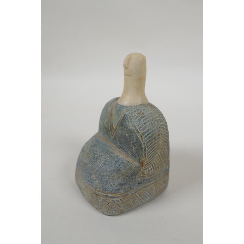 99 - A Bactrian style carved hardstone idol, 10cm high