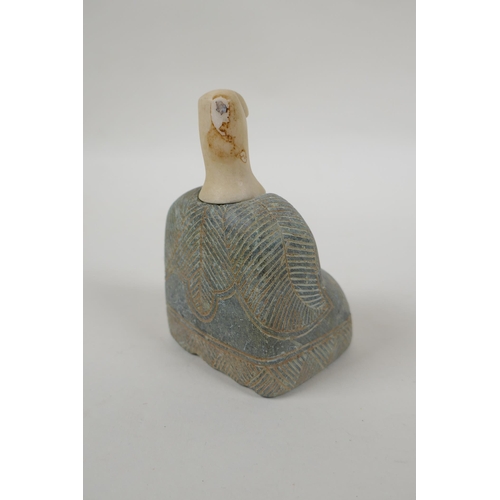 99 - A Bactrian style carved hardstone idol, 10cm high