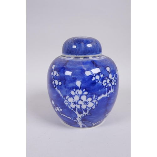 319 - A late C19th/early C20th Chinese blue and white porcelain ginger jar and associated cover, decorated... 