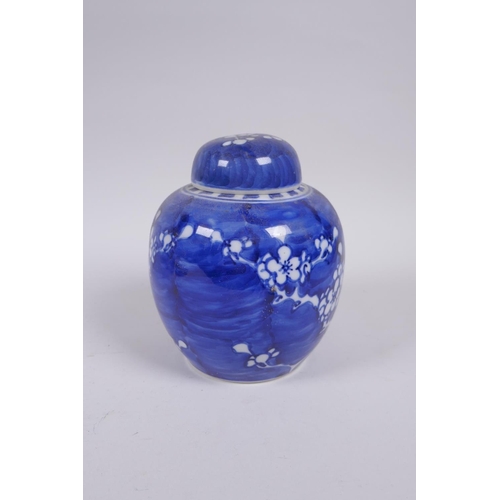 319 - A late C19th/early C20th Chinese blue and white porcelain ginger jar and associated cover, decorated... 