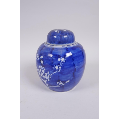 319 - A late C19th/early C20th Chinese blue and white porcelain ginger jar and associated cover, decorated... 