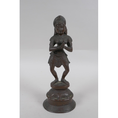 247 - An Indian bronze figure of a woman dancing, 22cm high