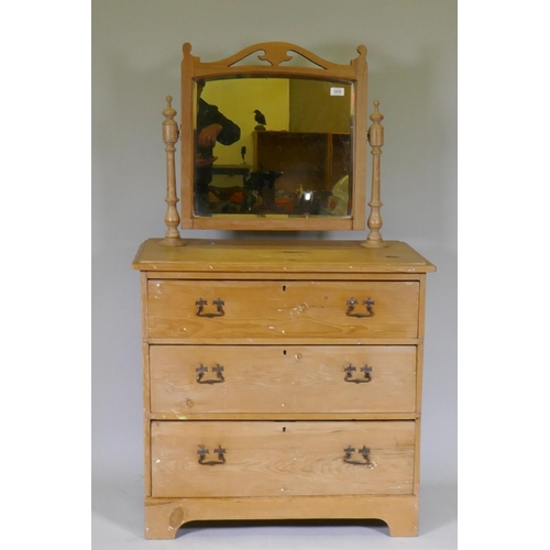 1156 - A Victorian stripped pine dressing table with swing mirror and three drawers, 81 x 46 x 17cm