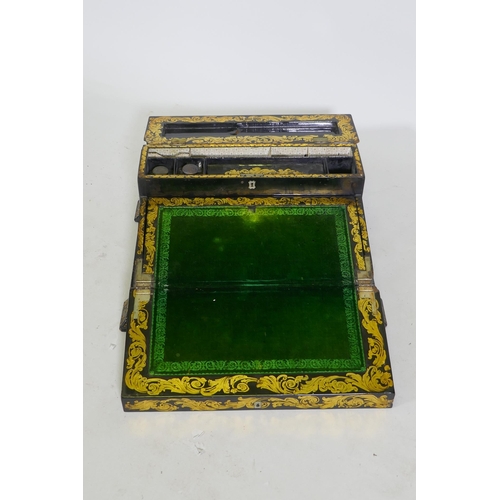 1 - A Victorian black lacquered papier mache writing slope, decorated in gilt and inlaid abalone shards,... 