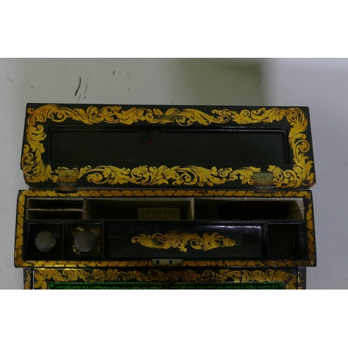 1 - A Victorian black lacquered papier mache writing slope, decorated in gilt and inlaid abalone shards,... 