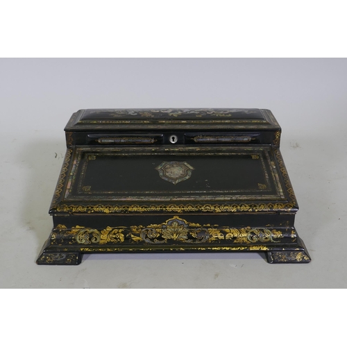 1 - A Victorian black lacquered papier mache writing slope, decorated in gilt and inlaid abalone shards,... 