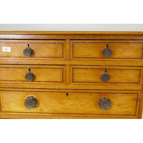 1001 - A Victorian polished pine chest of drawers with original painted decoration, four over four drawers ... 