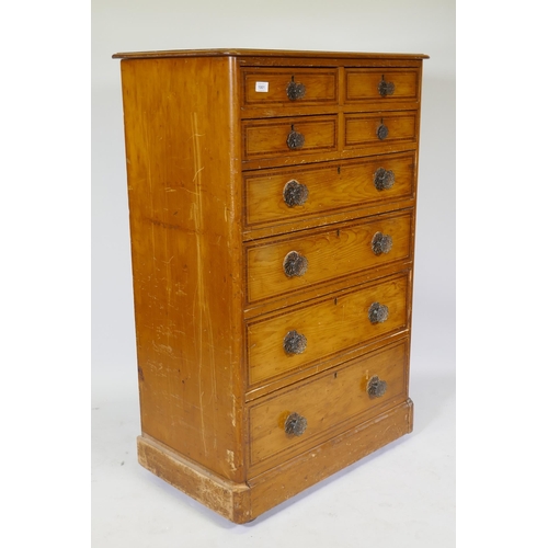 1001 - A Victorian polished pine chest of drawers with original painted decoration, four over four drawers ... 